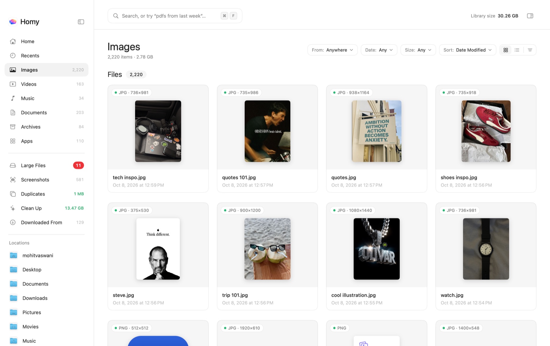 Homy showing the Images library as a grid of large thumbnails, with the sidebar listing Home, Recents, Images, Videos, Music, Documents, Archives and Apps